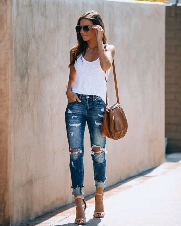Stretch Jeans With Ripped Feet And Slimming