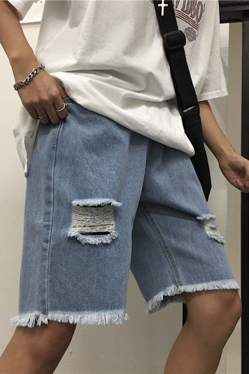 MAXIME Ripped raw jeans
