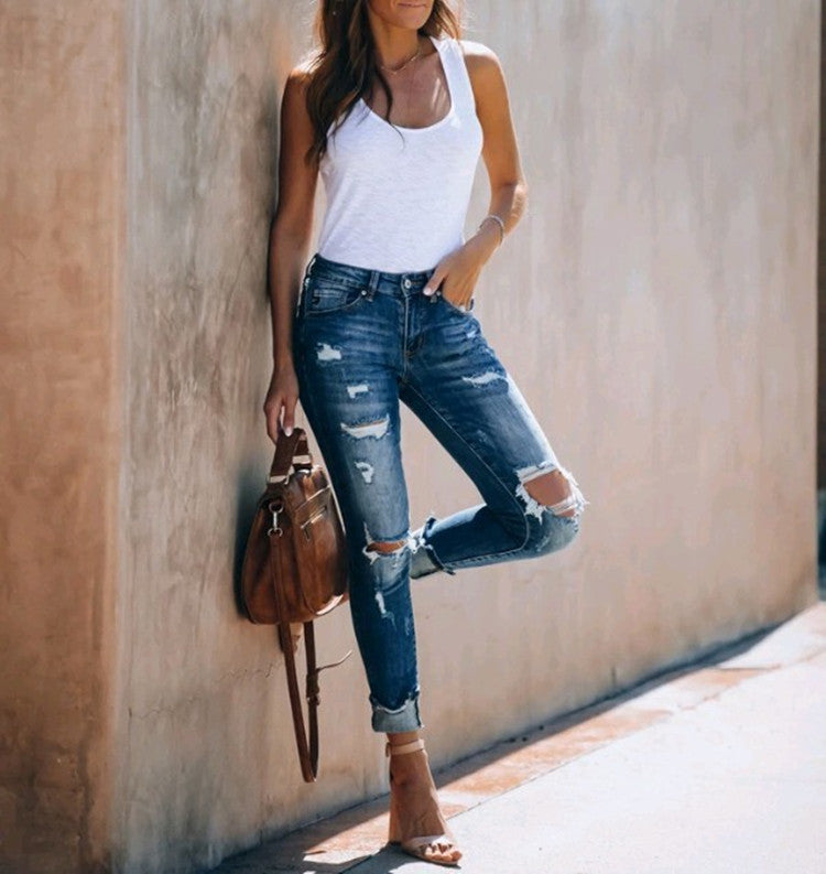 Stretch Jeans With Ripped Feet And Slimming